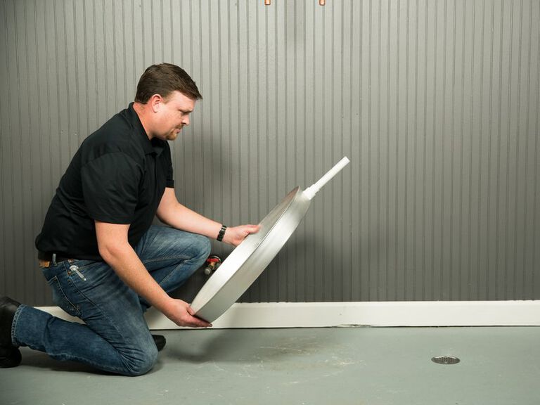 Installing the Metal Drain Pan Installing the Metal Drain Pan