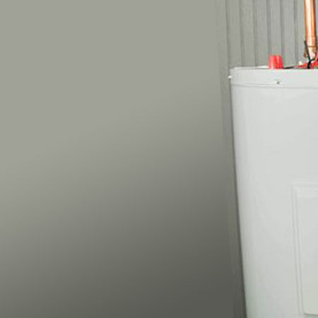 man working on water heater man working on water heater